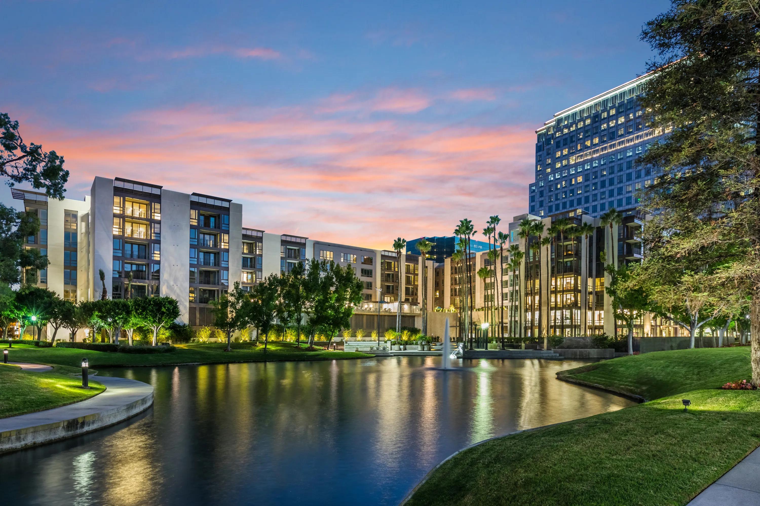 exterior of 580 anton apartments for rent in costa mesa ca during sunset