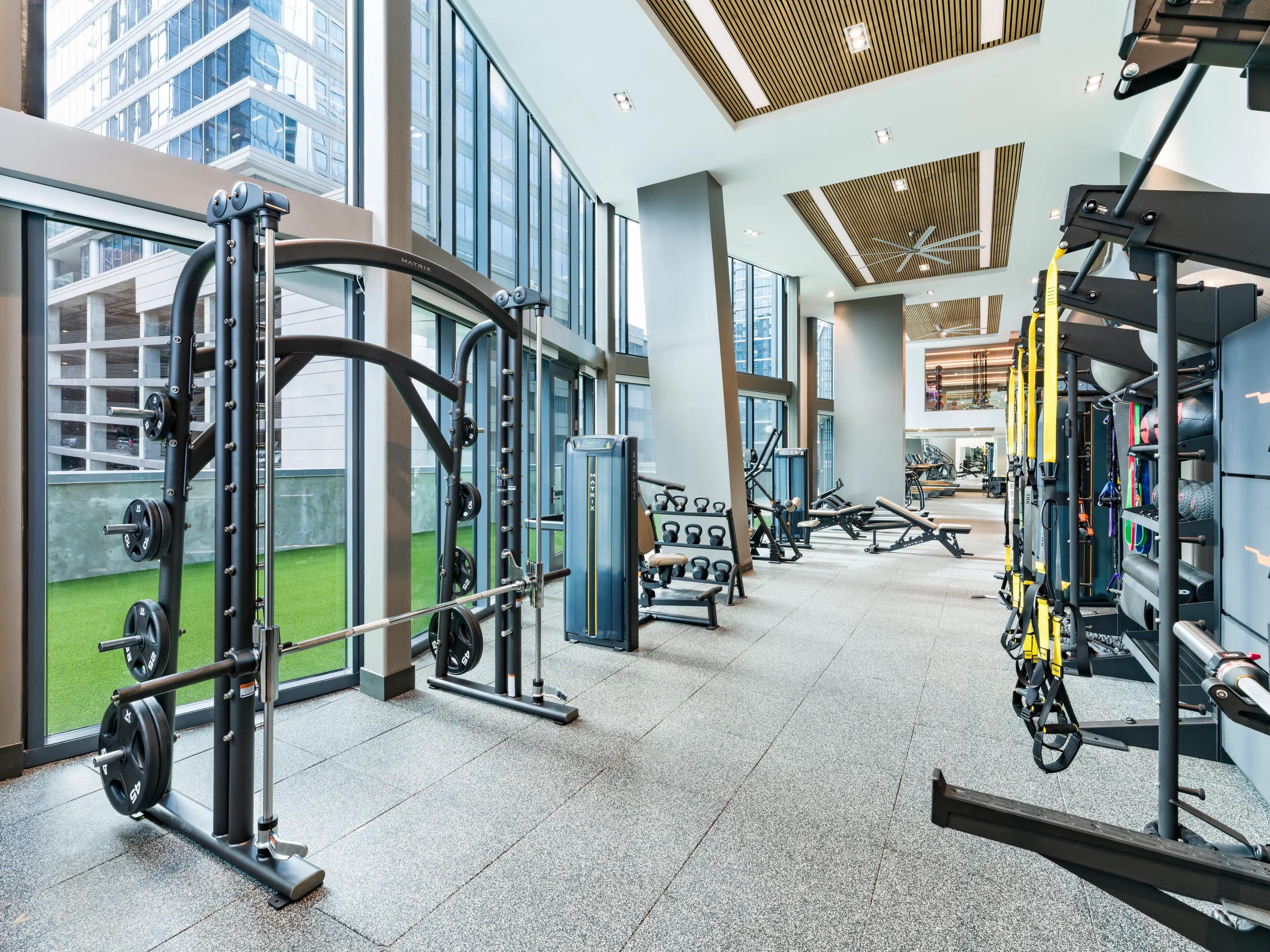 two story fitness center with cardio equipment modera mcgavock apartment homes for rent in nashville tn