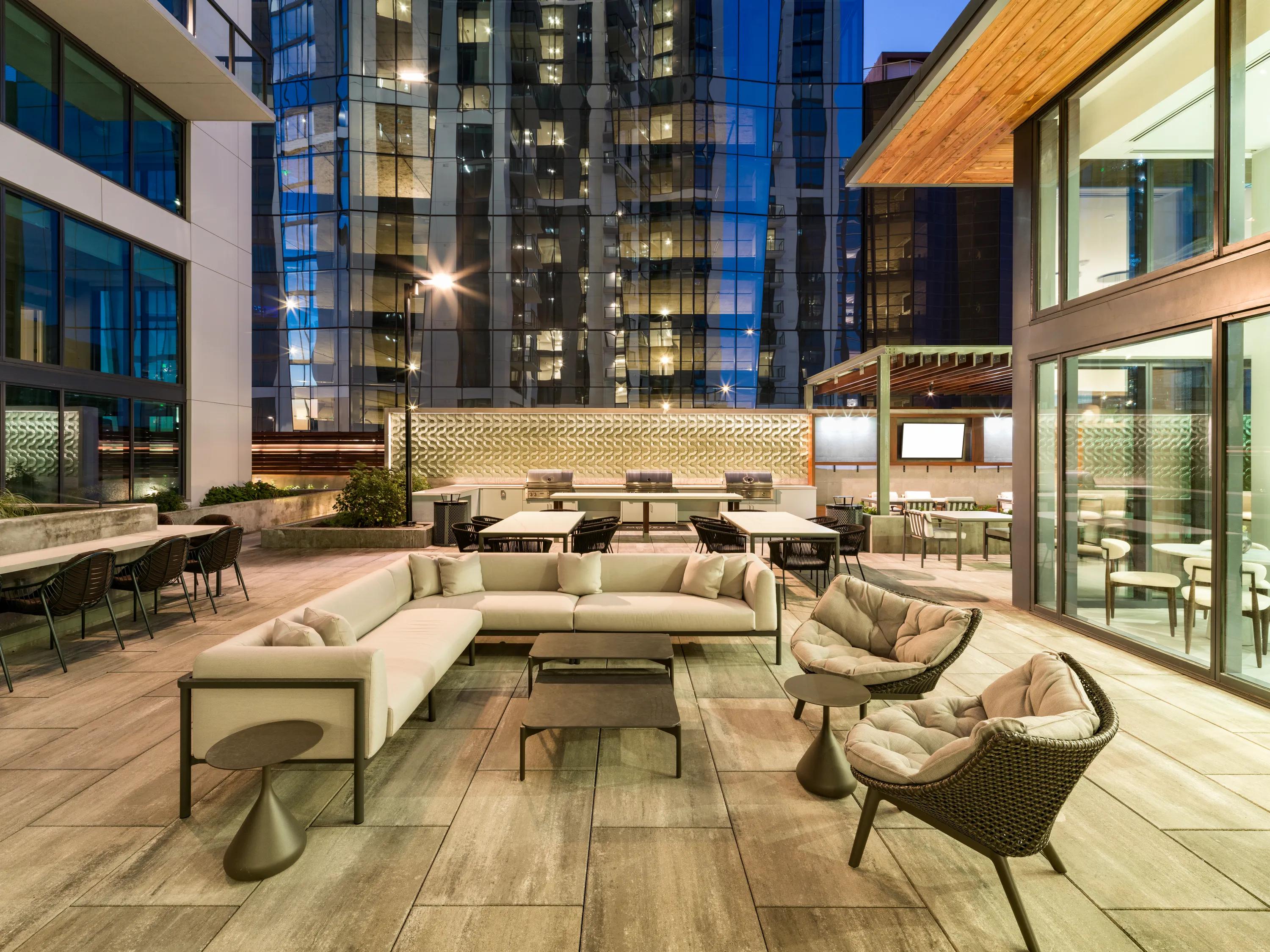 clubroom with outdoor terrace and seating area modera mcgavock apartment homes for rent in nashville tn