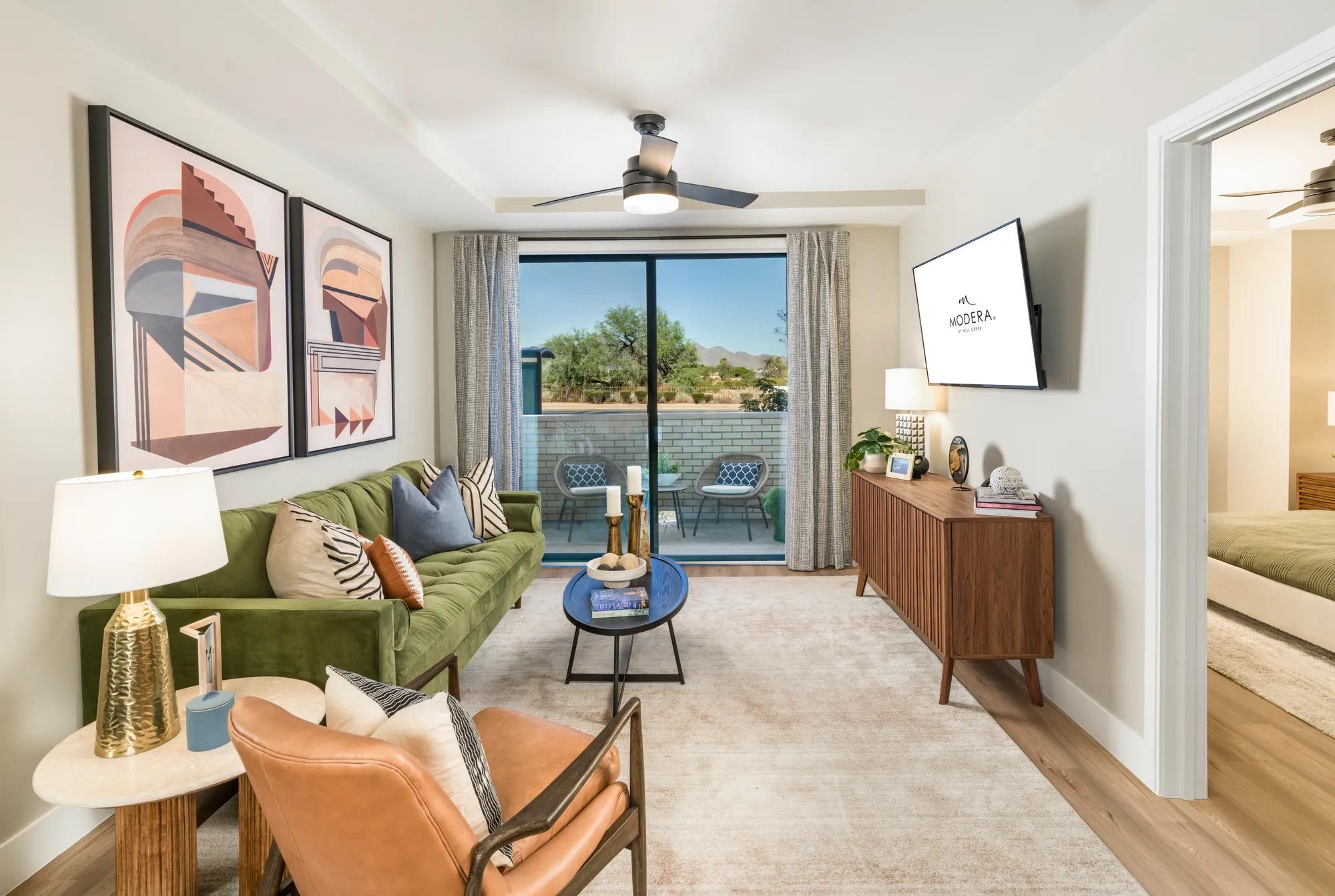 living room with furniture leading to patio at modera scottsdale apartment homes for rent in scottsdale az