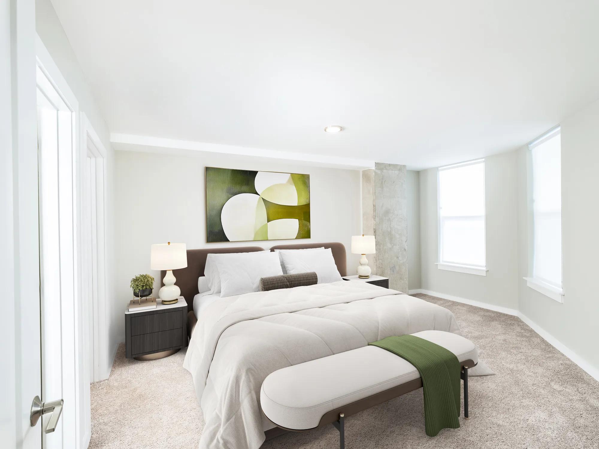 spacious bedroom with two large windows and tasteful furniture modera loso apartment homes for rent in charlotte nc