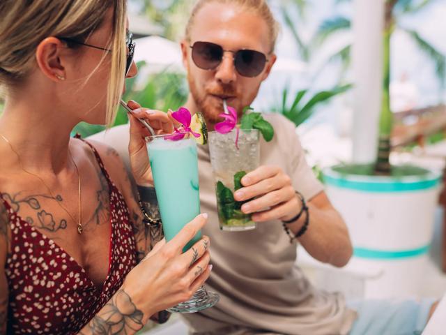 couple drinking island inspired cocktails modera aventura miami fl