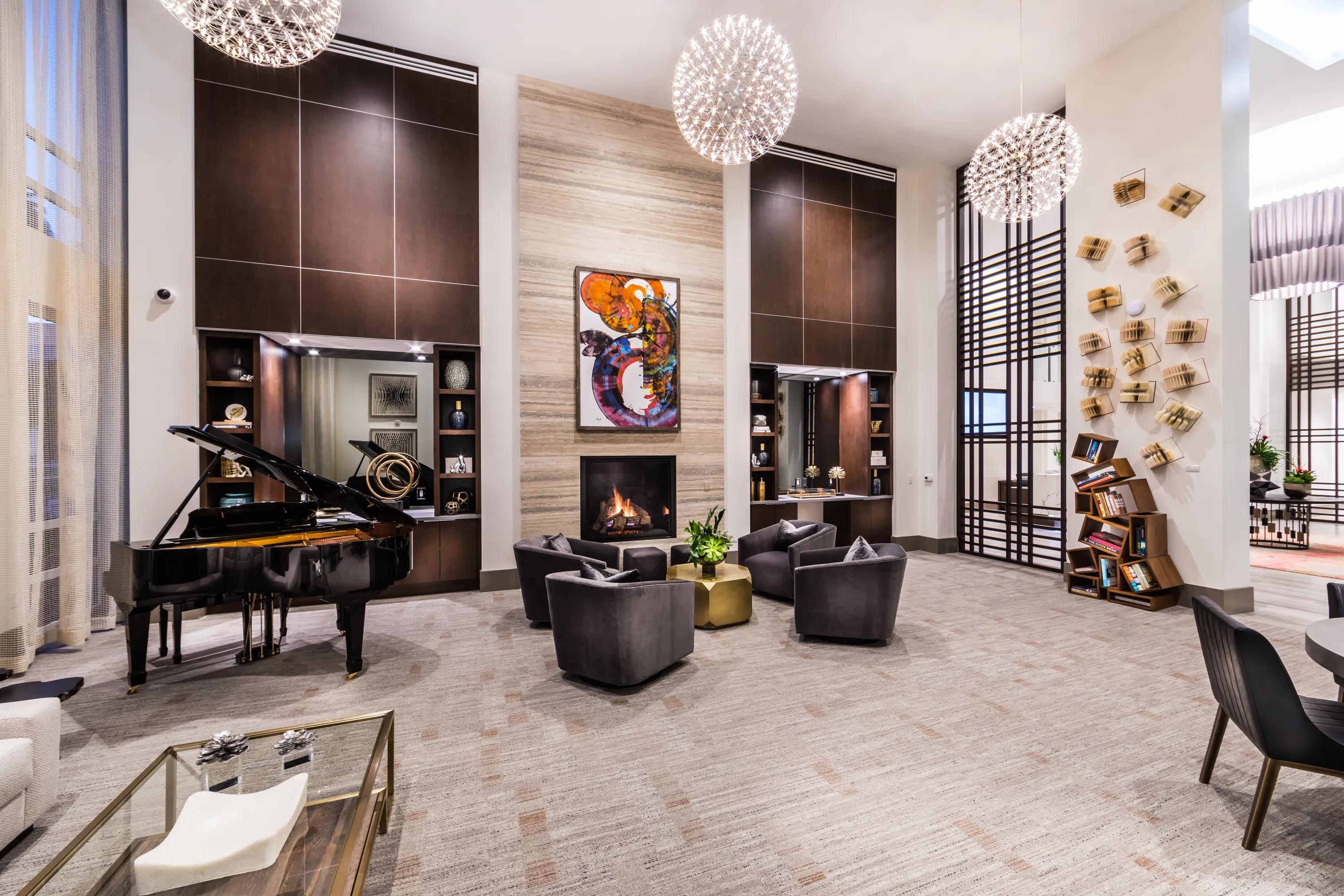 Grand salon with fireplace and piano for elegant relaxation 580 anton apartments