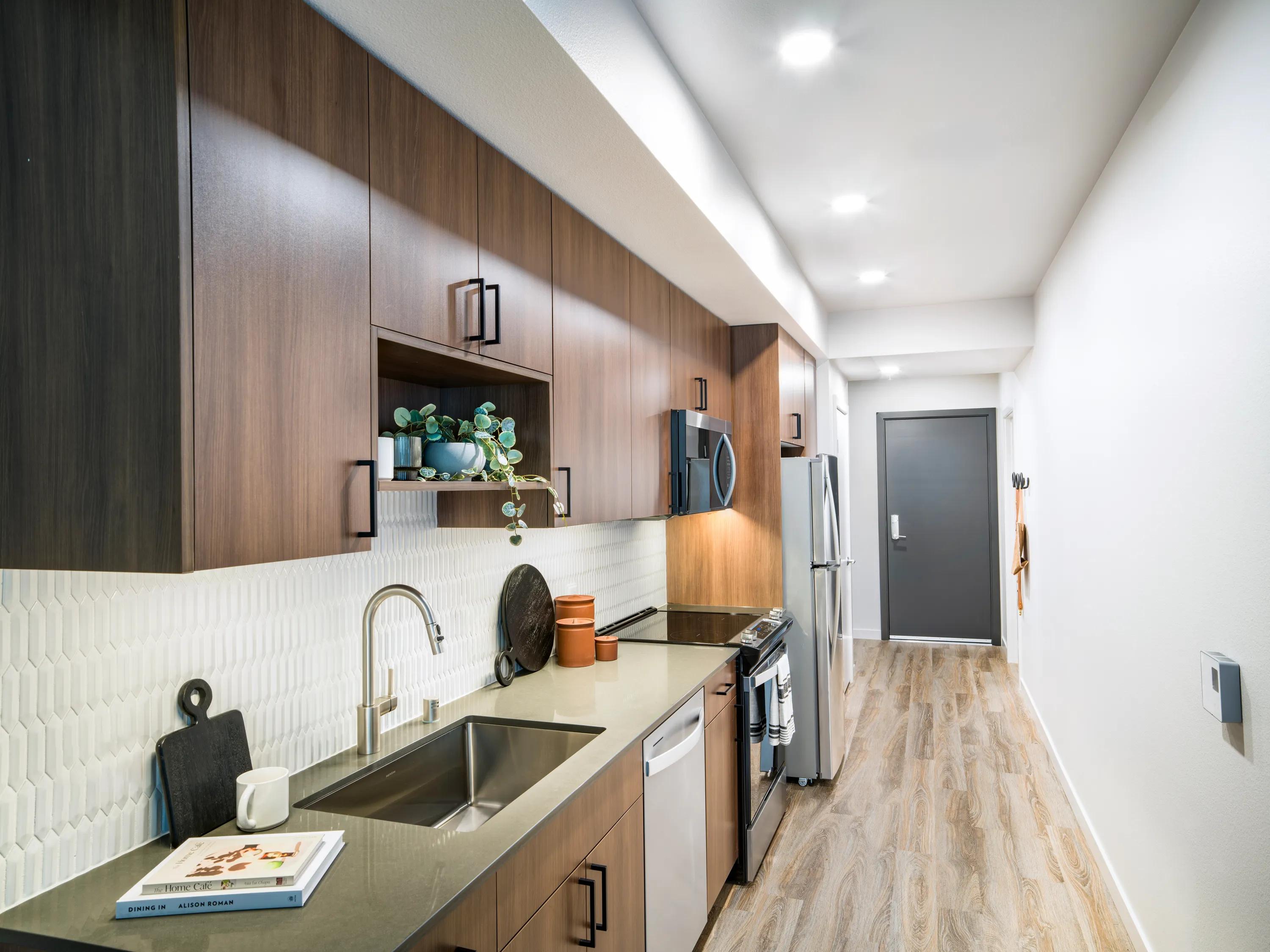 Single-basin sinks with pull-down faucet modera shoreline apartments