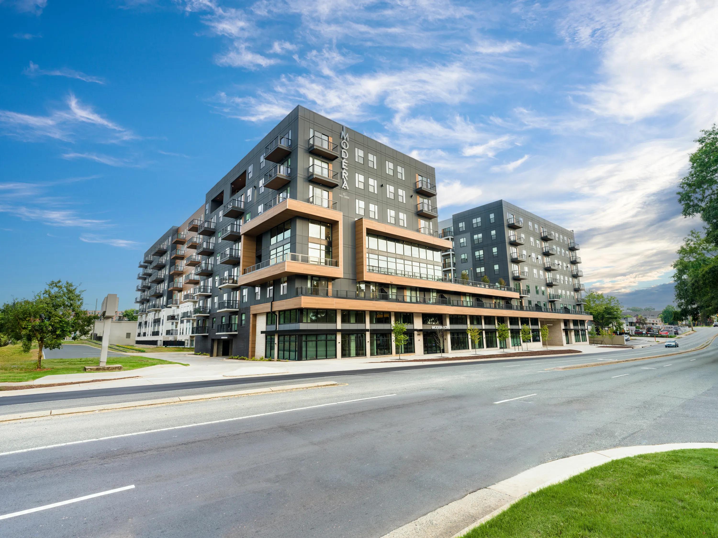 exterior view of building at street level modera loso apartment homes for rent in charlotte nc