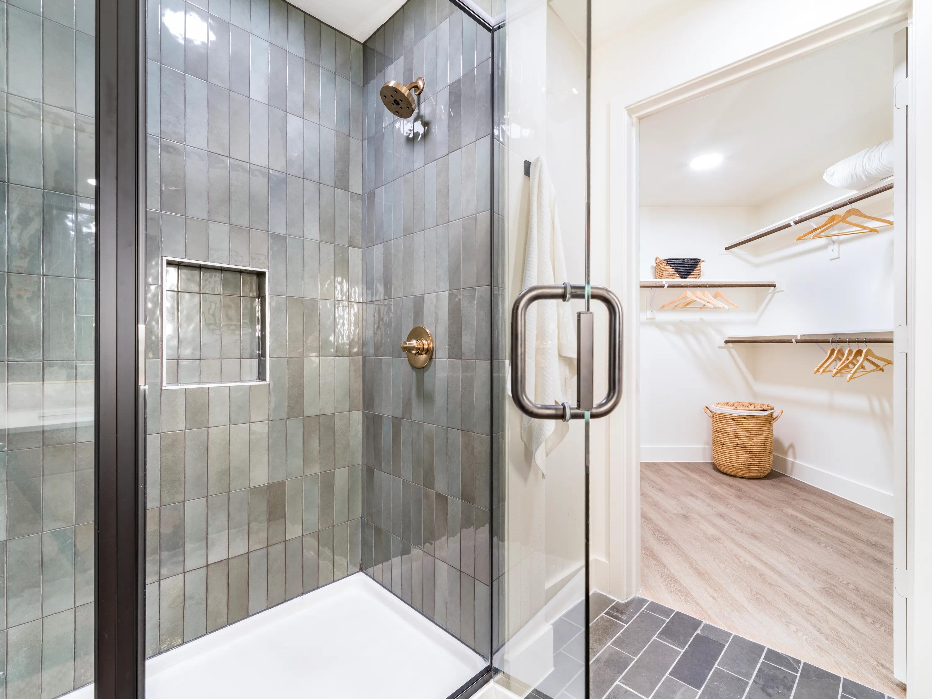 stunning bathroom with custom shower and vanity modera st paul apartments in dallas tx