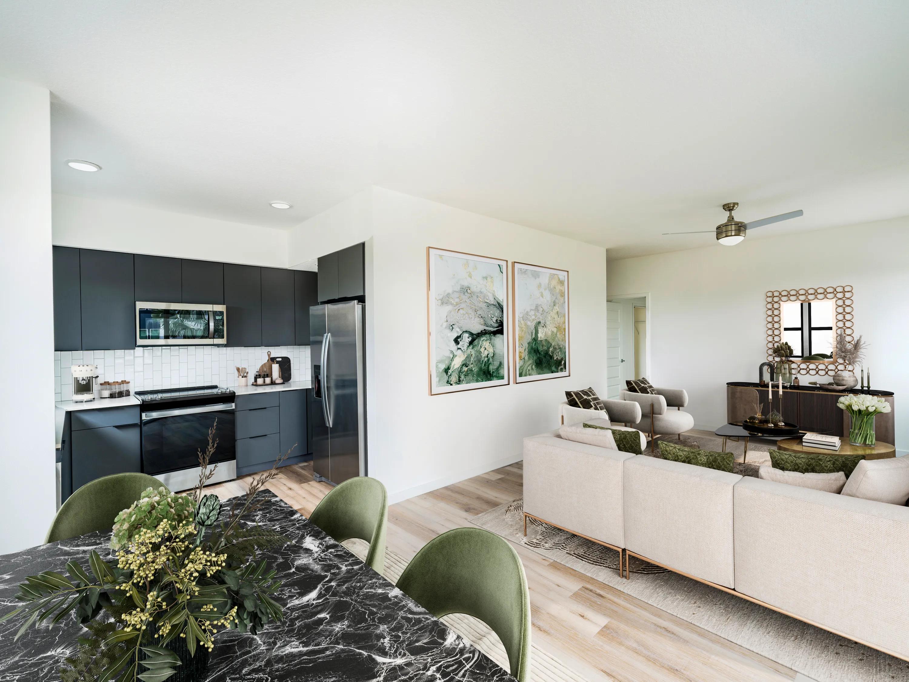 dark kitchen cabinets with modern living area modera encore apartments in tampa fl