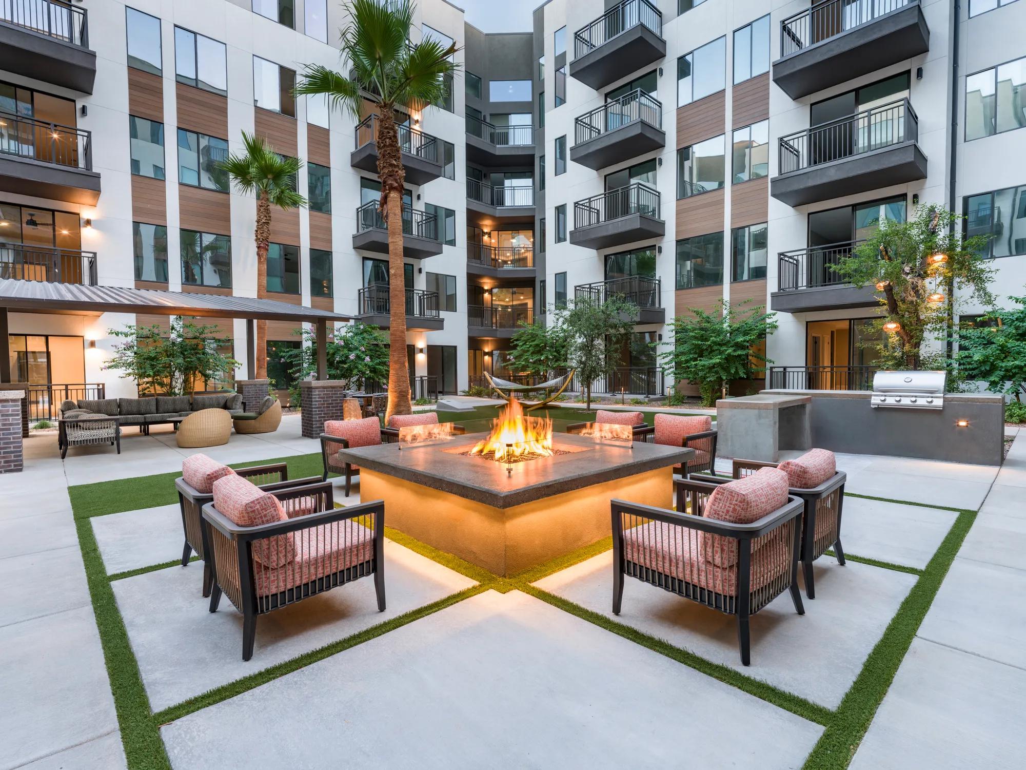 courtyard with grill and fire table at modera scottsdale apartment homes for rent in scottsdale az