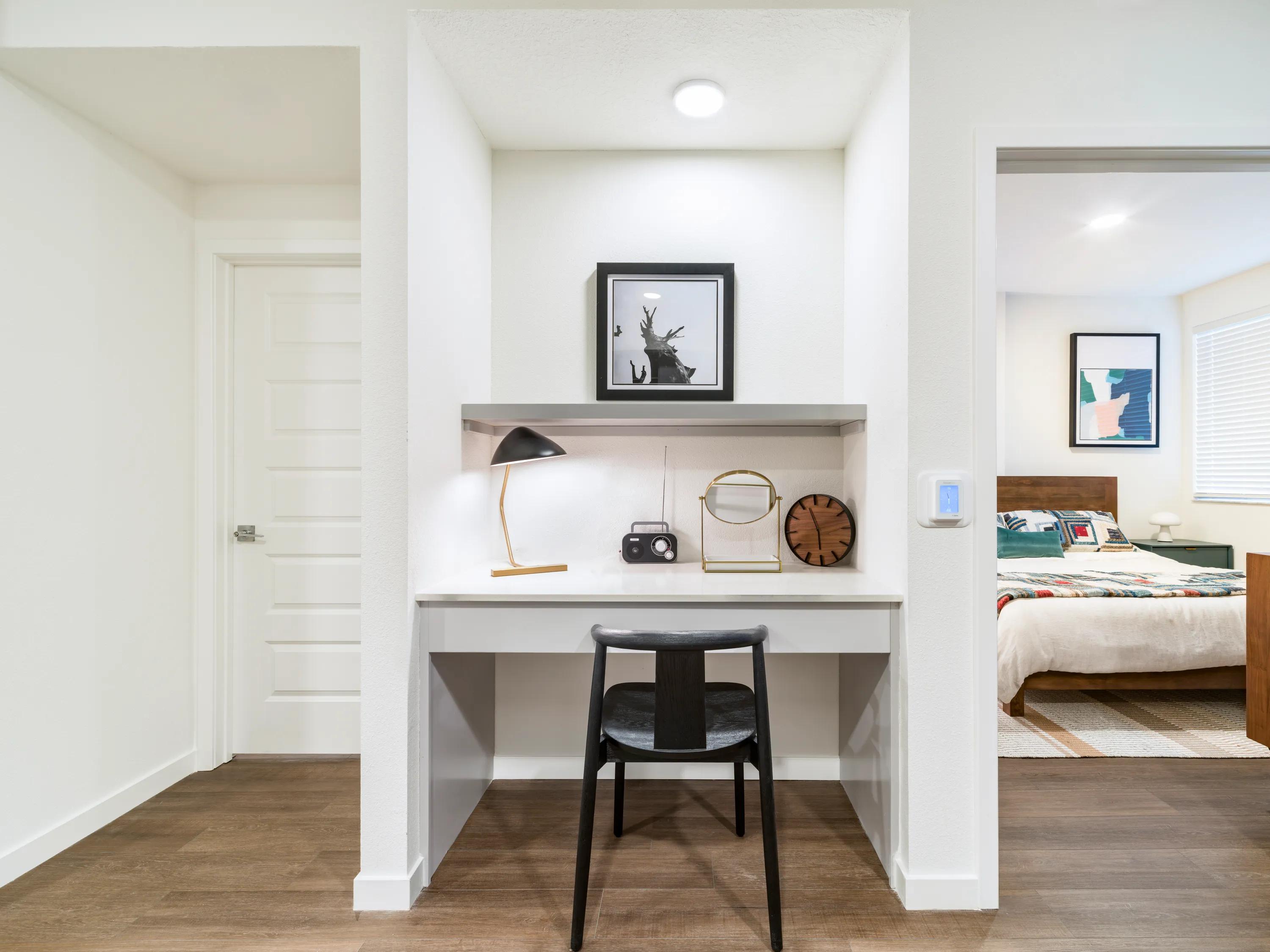 Built-in workspace with open shelving and dedicated task space, apartments in tampa, fl