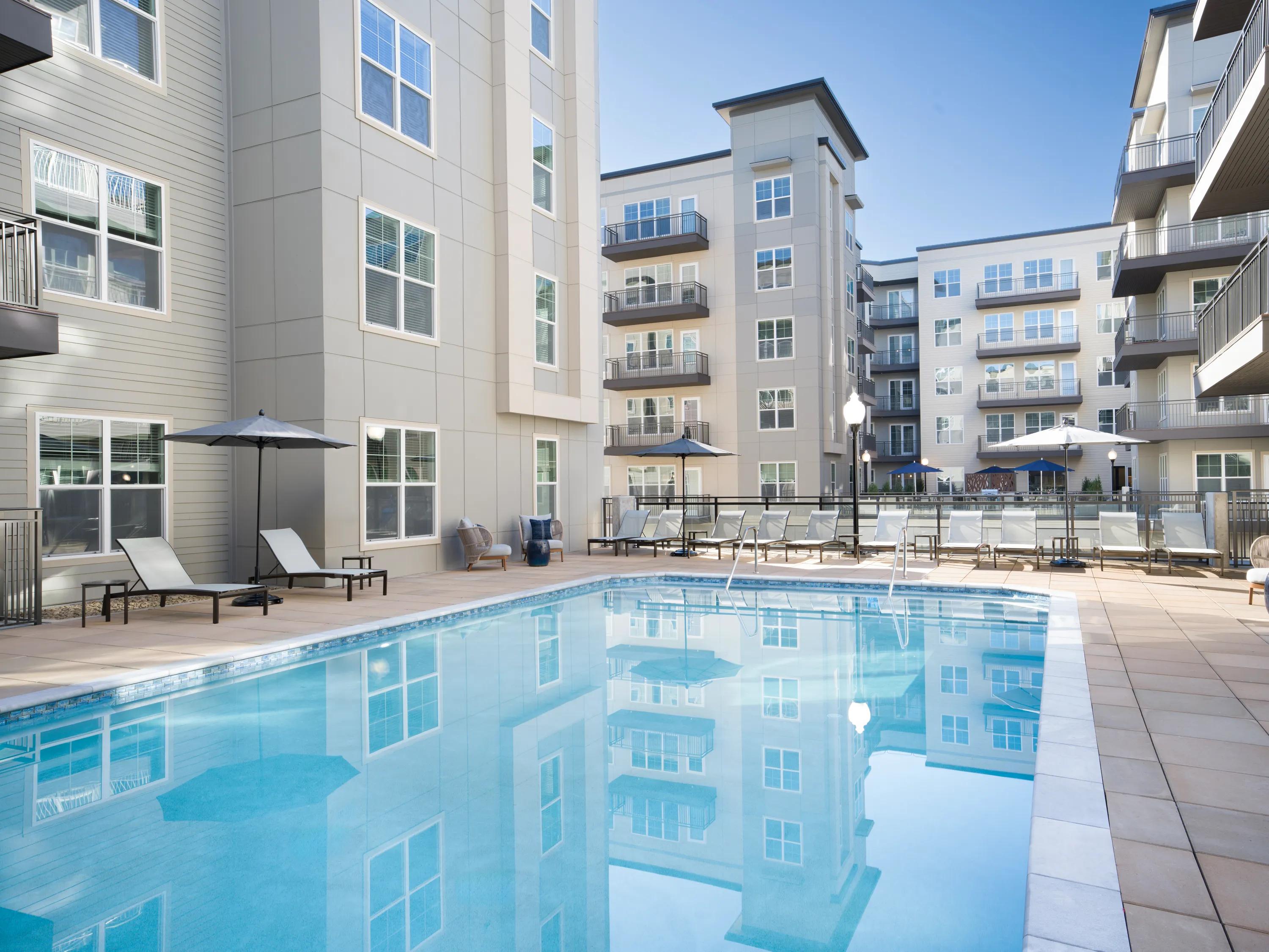 exterior rendering pool amenity sundeck modera liberty row apartment homes for rent in charlotte nc