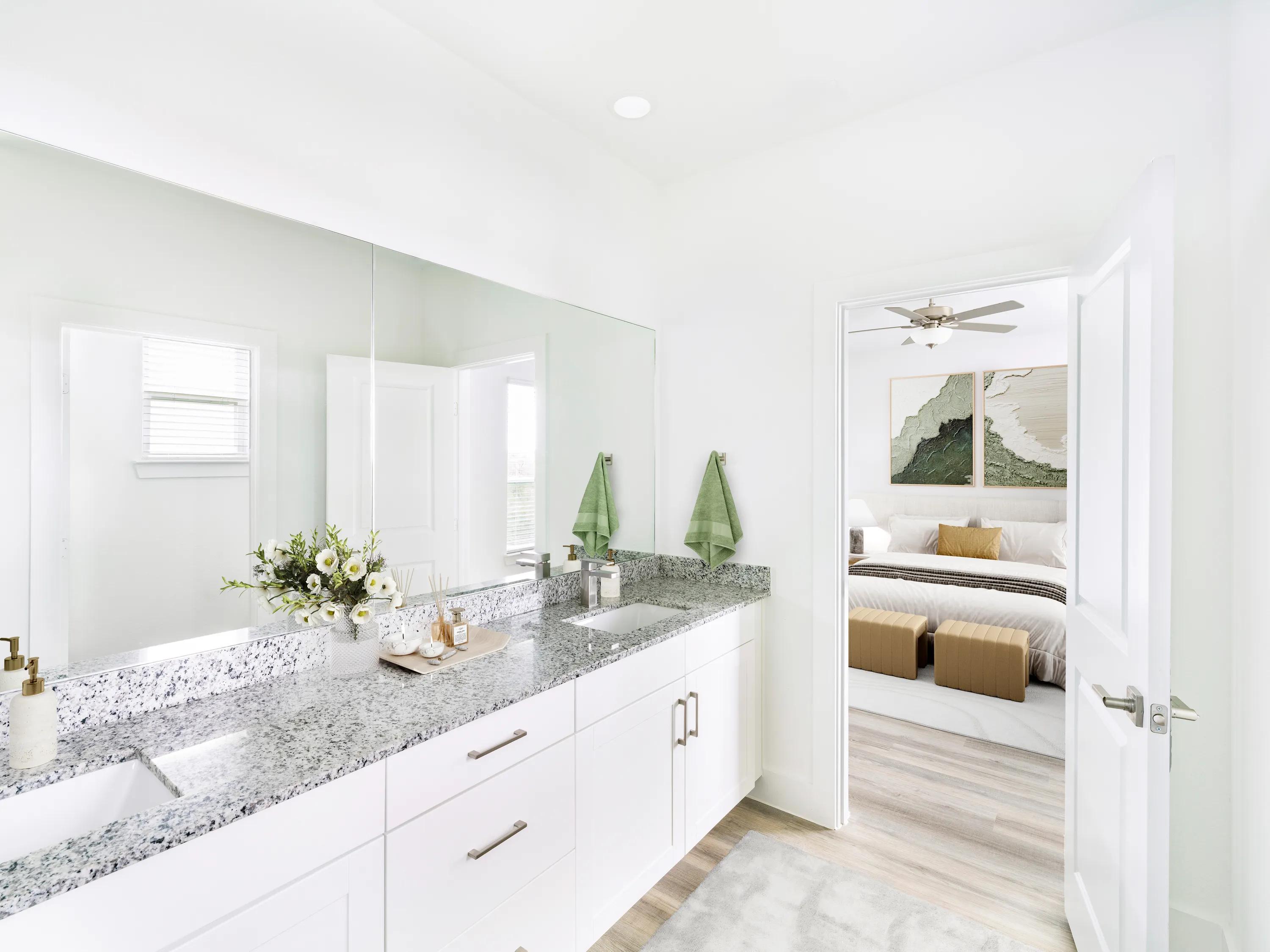 bathroom with glass enclosed shower at amavi celina single family homes for rent in texas