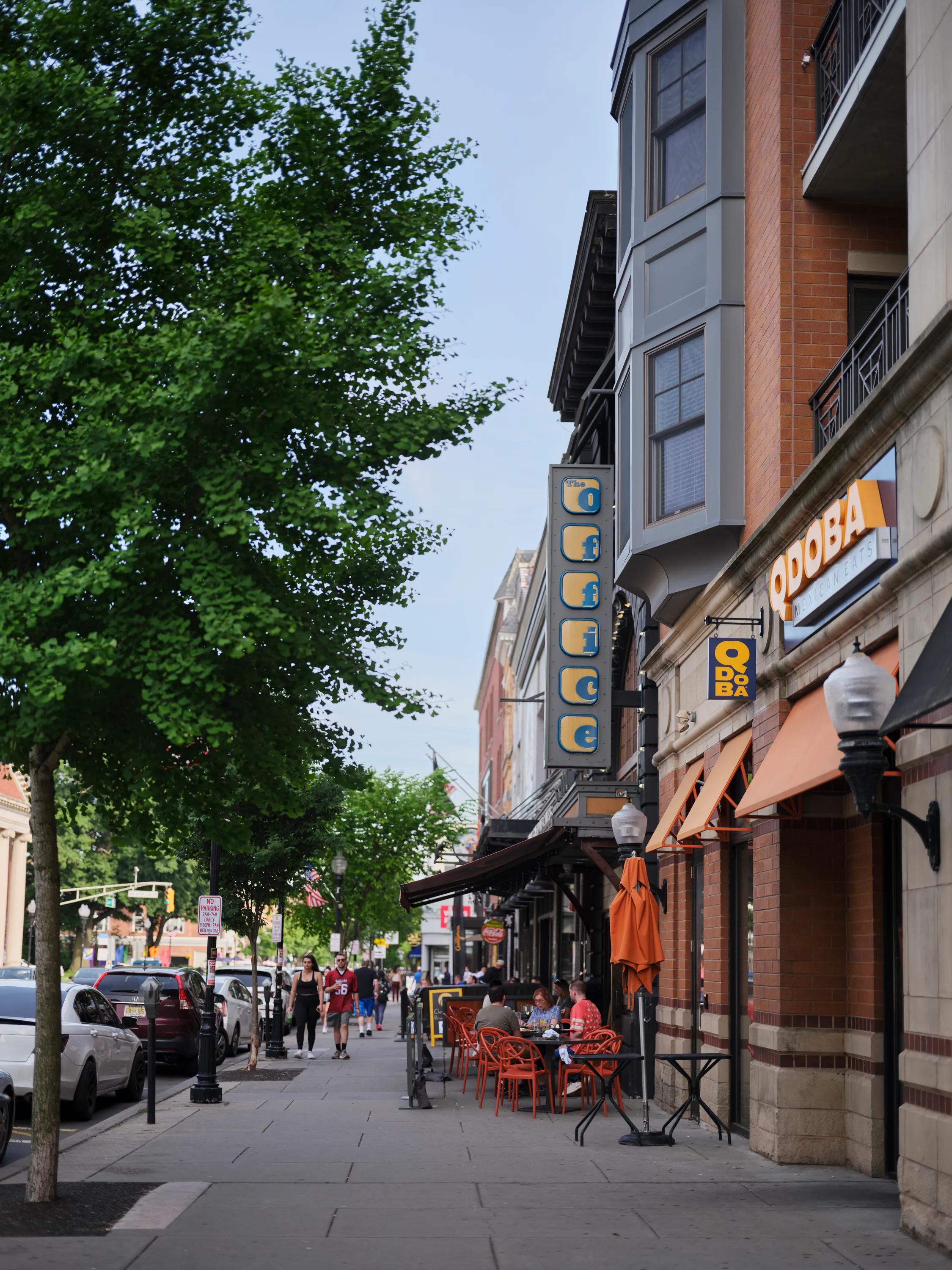 qdoba entrance with sidewalk view down street metropolitan at 40 park apartment homes for rent in morristown nj