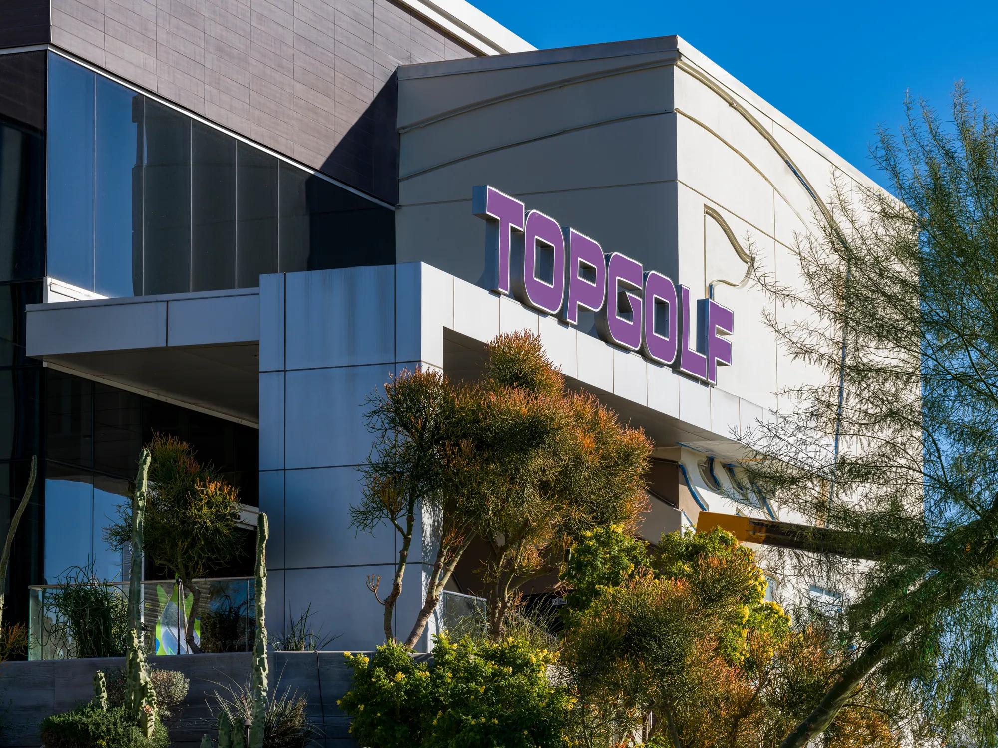 topgolf exterior building with sign at modera higley commons apartment homes for rent in gilbert az