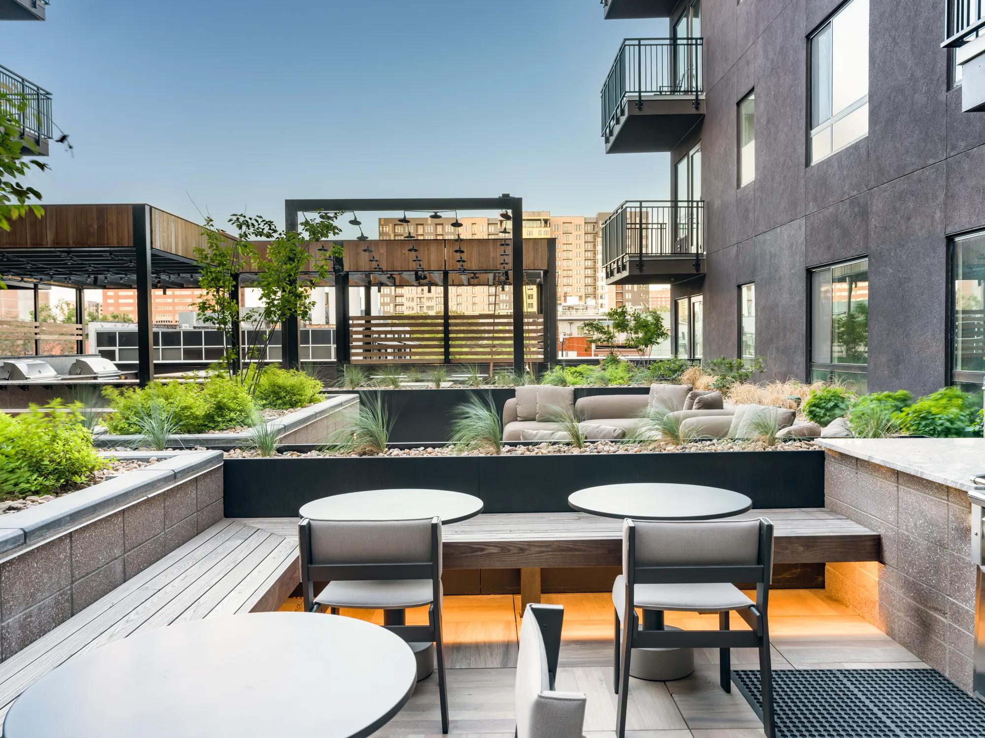 outdoor seating on rooftop and work from home space with garden modera golden triangle apartment homes for rent in denver co
