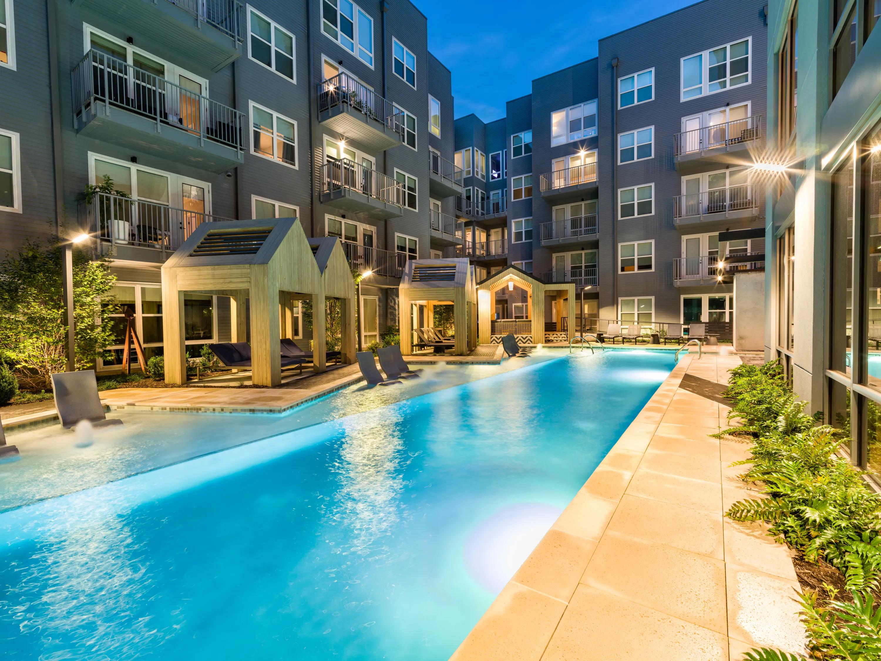 resort style pool with cabanas modera old ivy apartments in atlanta ga