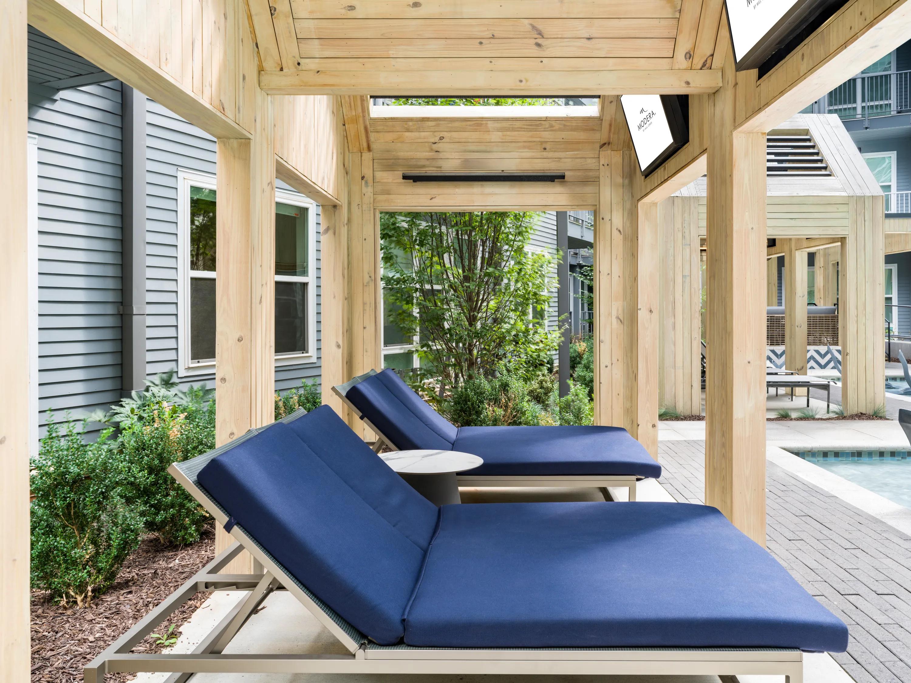 poolside cabanas with lounge chairs modera old ivy apartments in atlanta ga