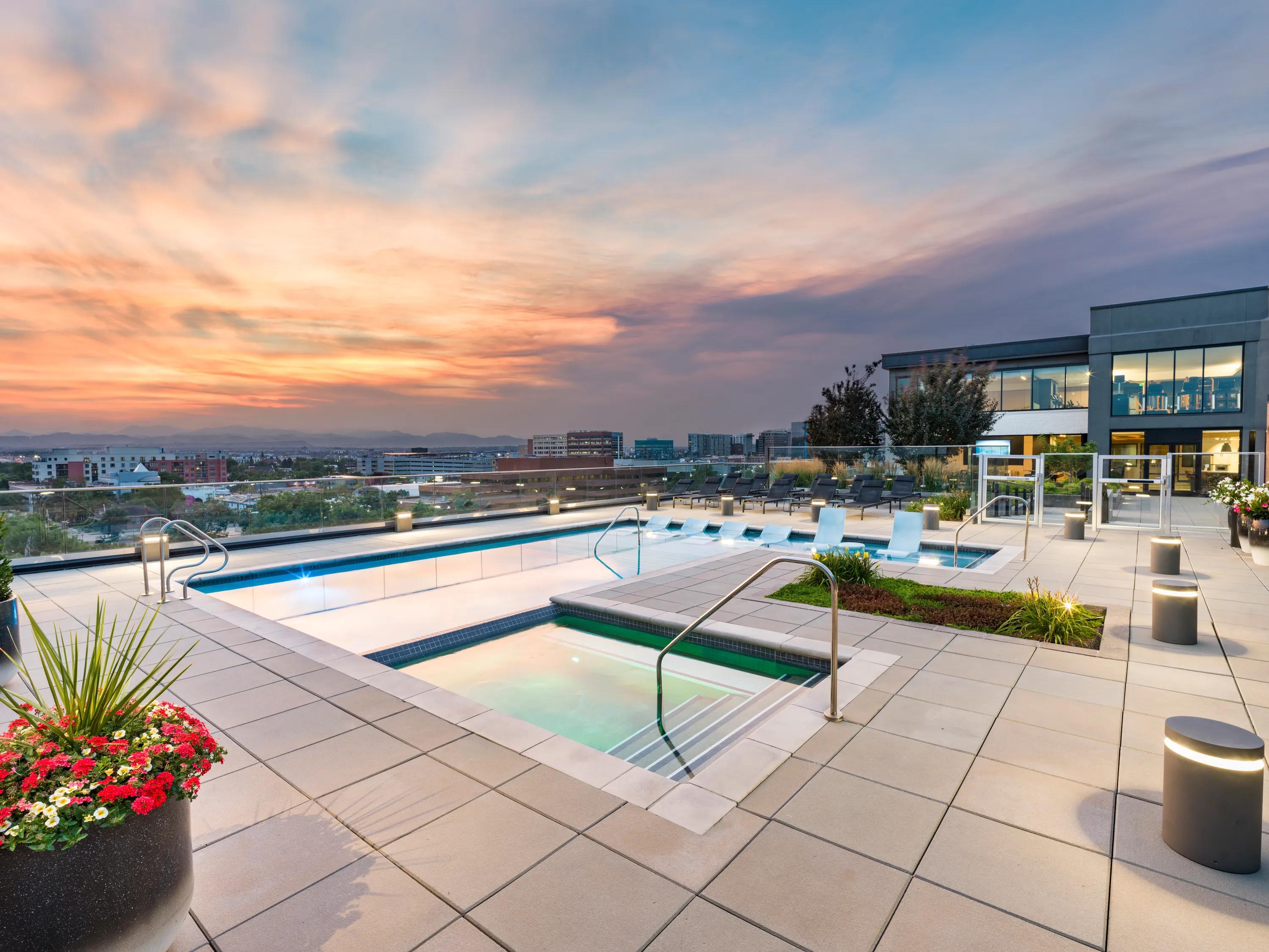 pool with plants surrounding modera west wash apartments for rent denver co
