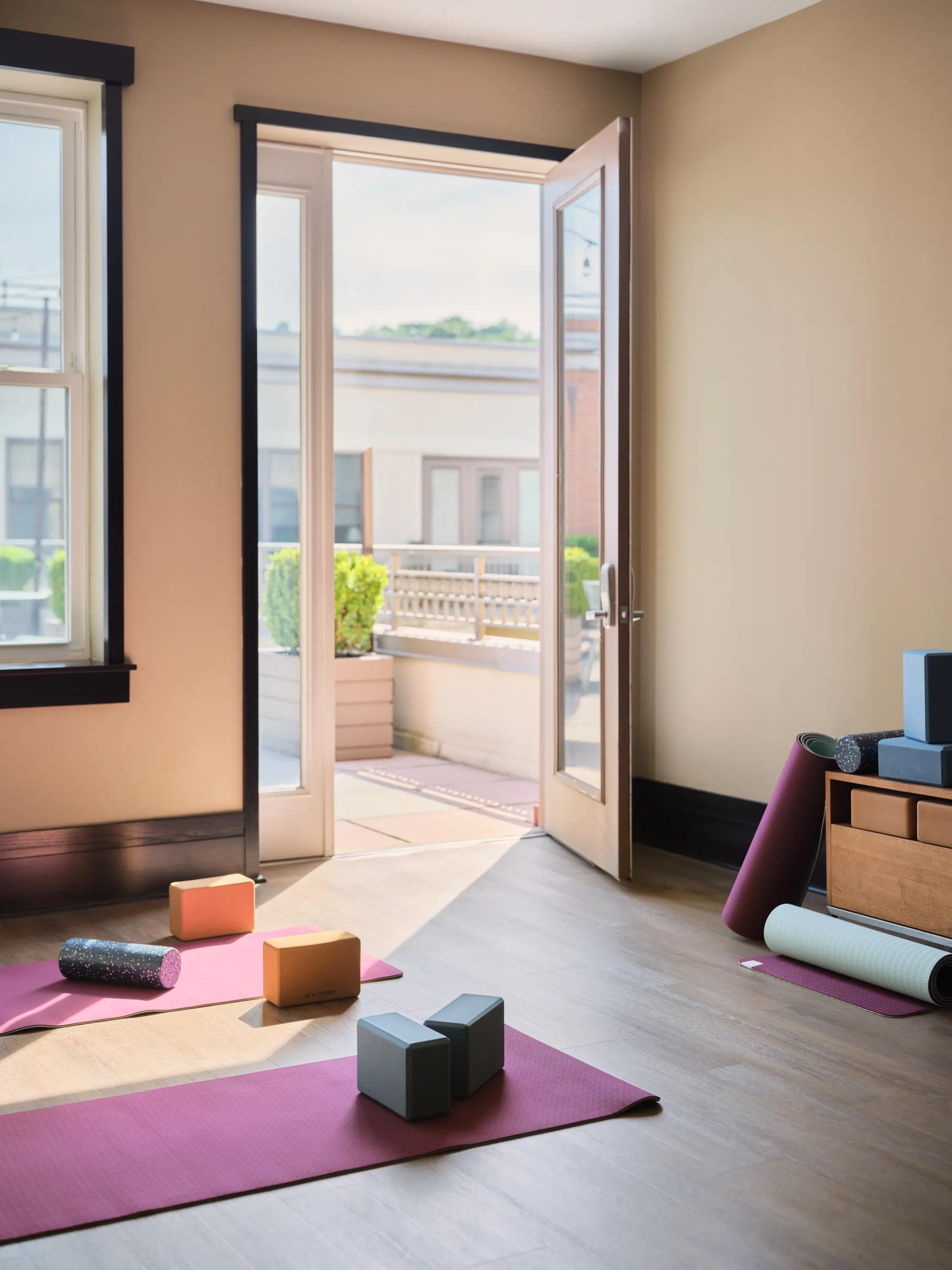 yoga space with door leading to outside on sunny day metropolitan at 40 park apartment homes for rent in morristown nj