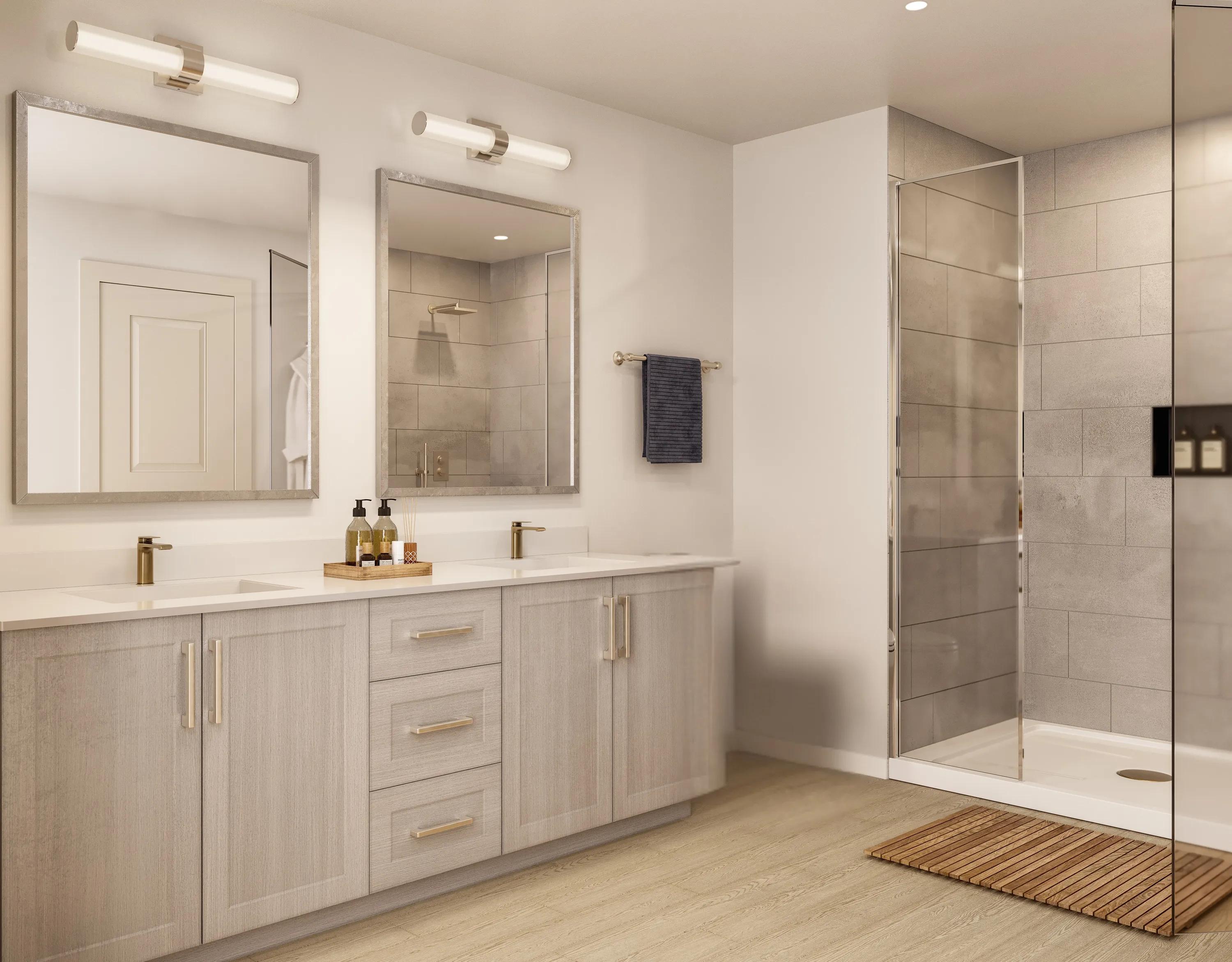 Designer bathrooms with double vanities and quartz countertops modera walsh heights apartments