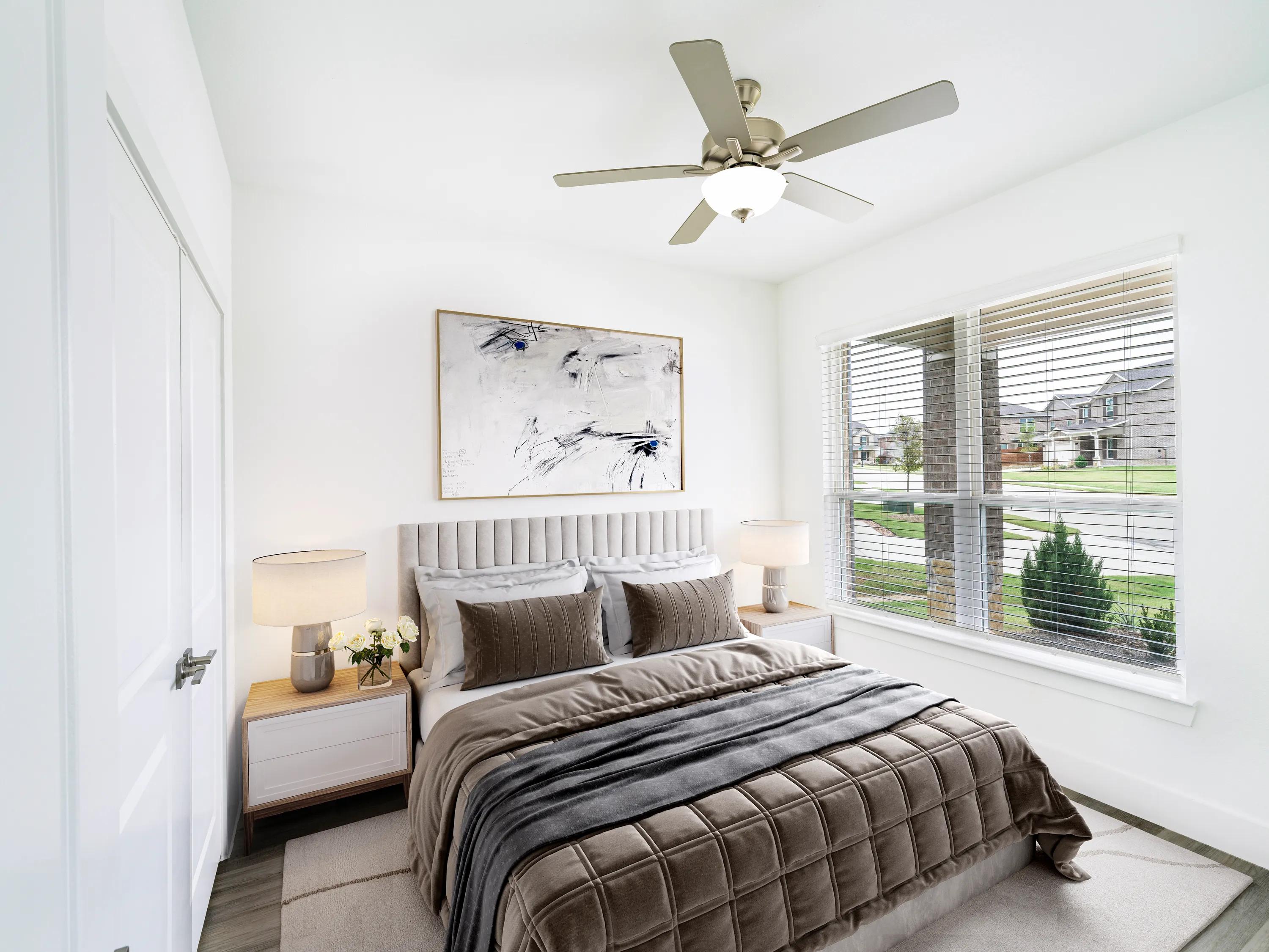 bedroom with bed and ceiling fan at amavi celina single family homes for rent in texas