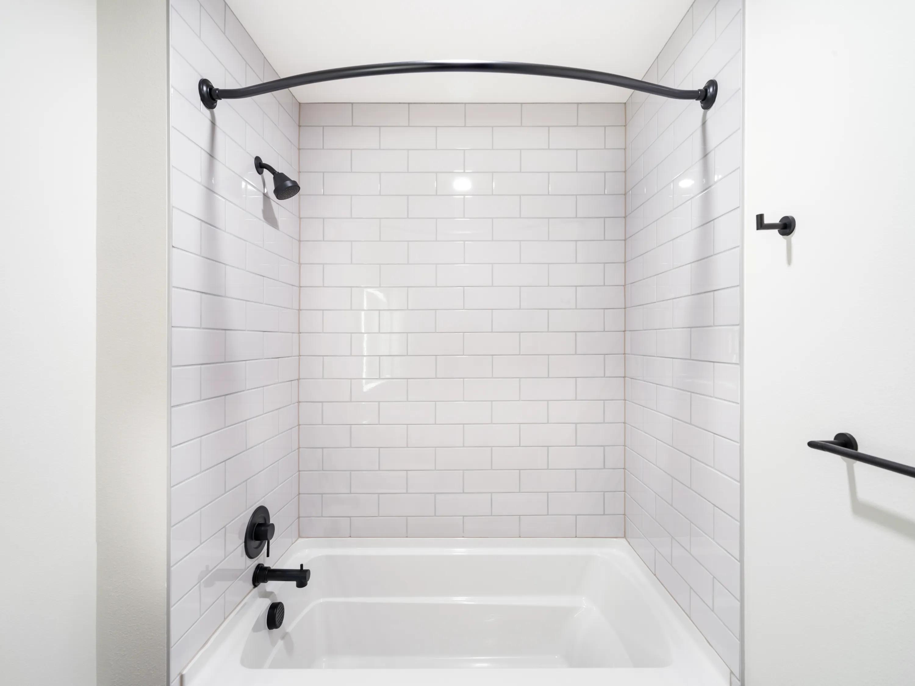 bathroom with tile backsplash and soaking tub modera bridle trails apartment homes for rent