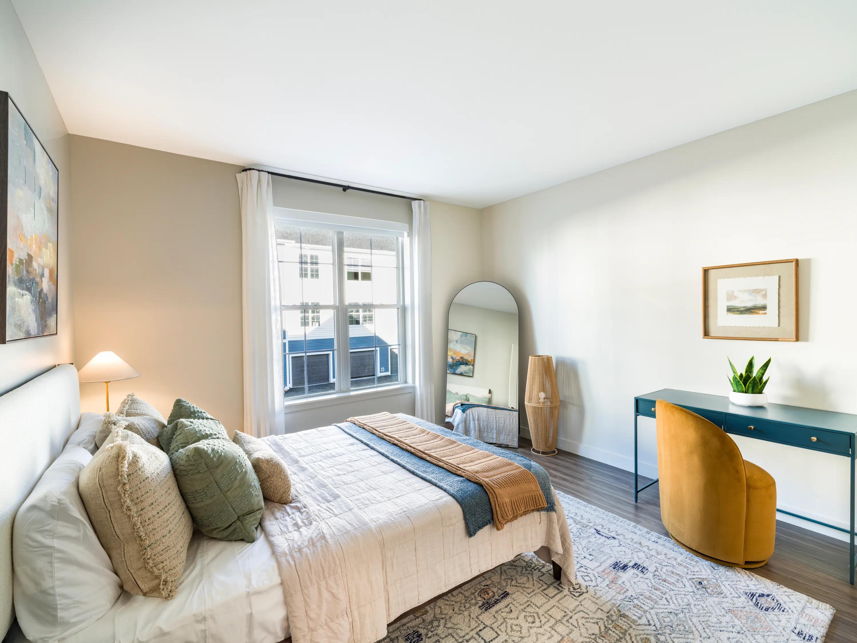 large bedroom with closet and window modera south shore apartment homes for rent in marshfield ma