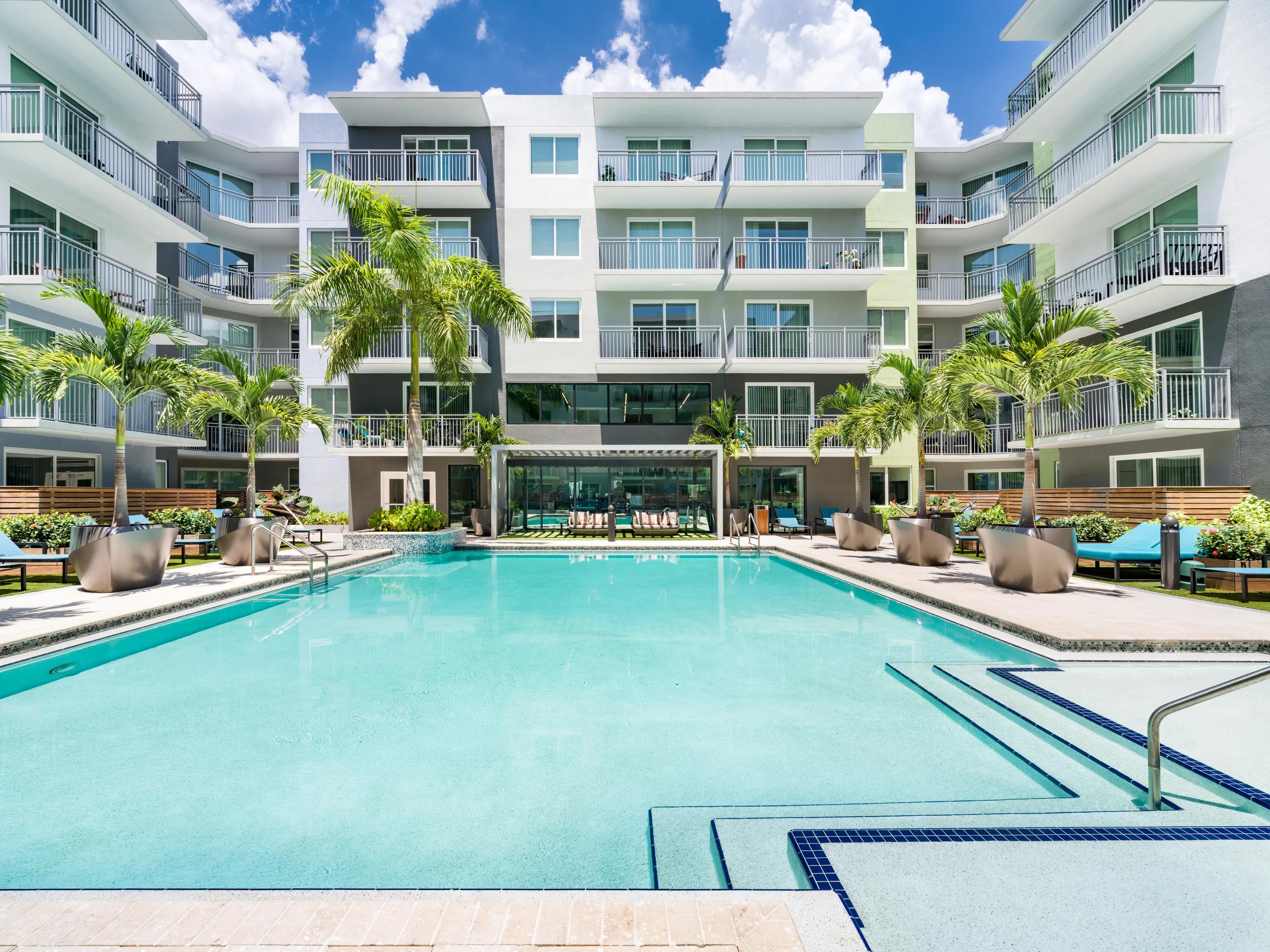 exterior building at street level with retail options modera encore apartment homes for rent in tampa fl
