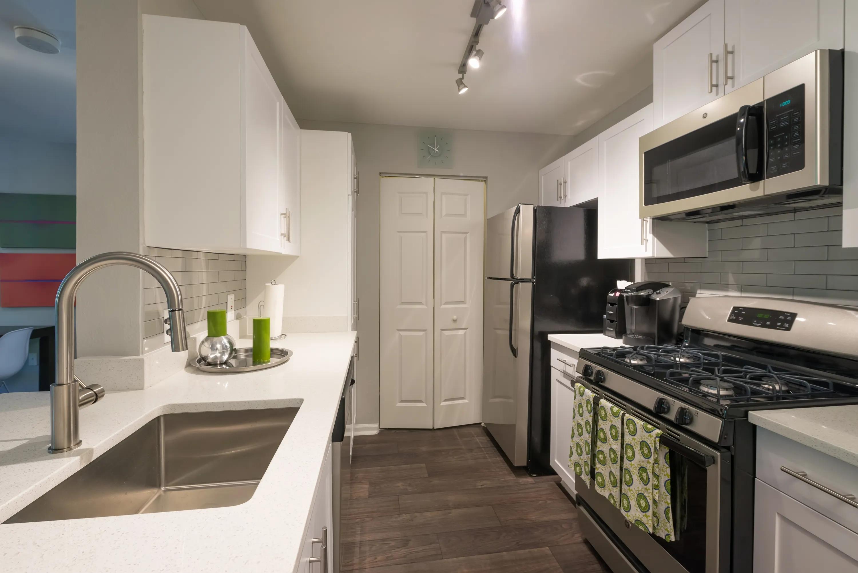 Image of stainless steel appliances alister quincy apartments near boston