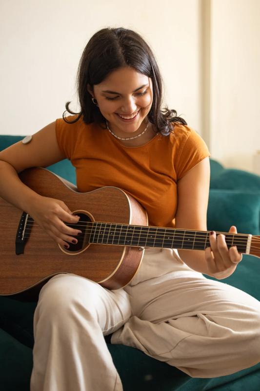 modera higley commons apartments in az young girl playing guitar