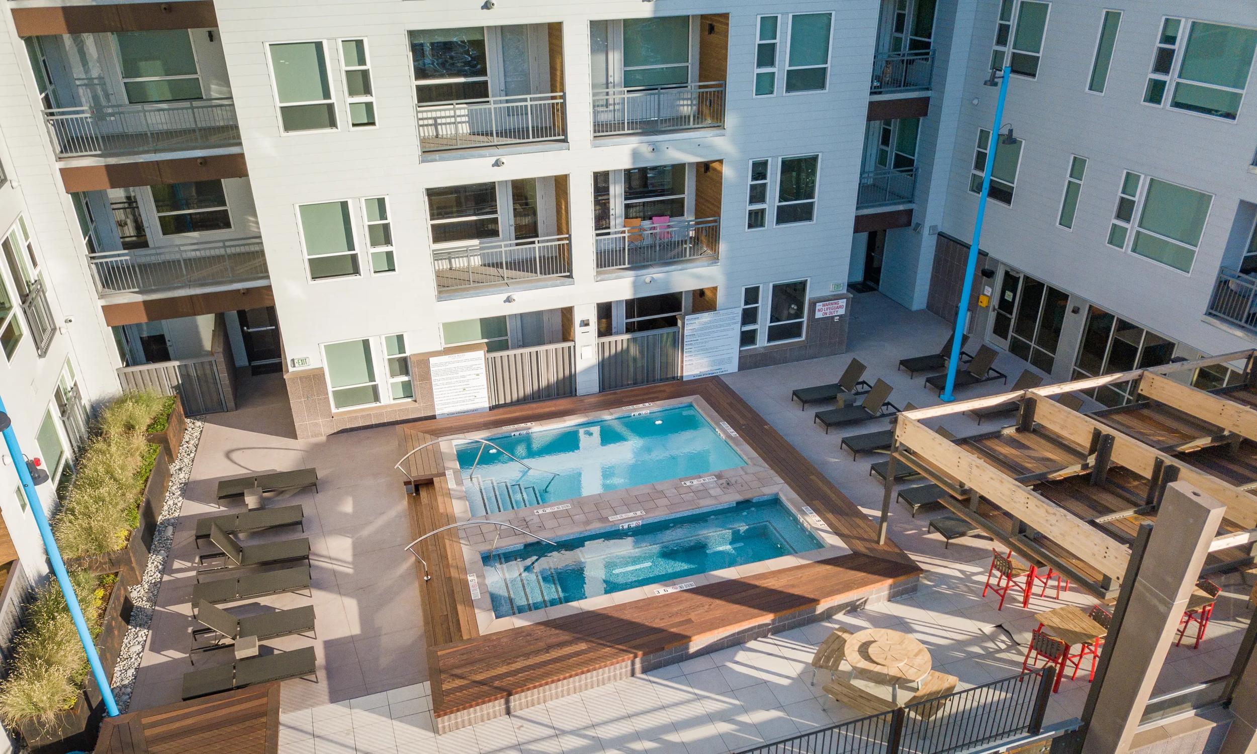 rooftop pool from arial view modera river north apartments in denver co