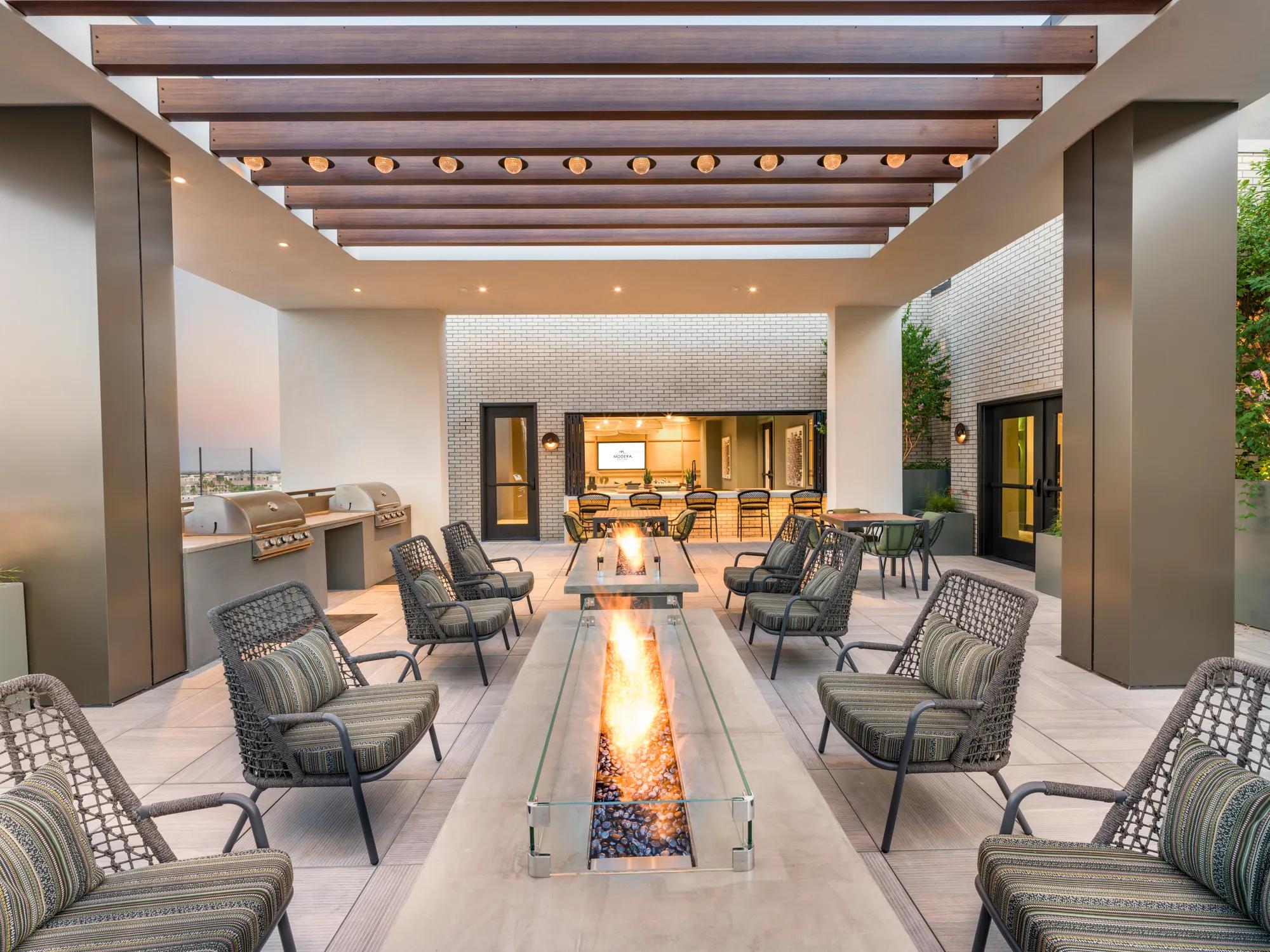 firetables on rooftop lounge with bbq grills at modera scottsdale apartment homes for rent in scottsdale az