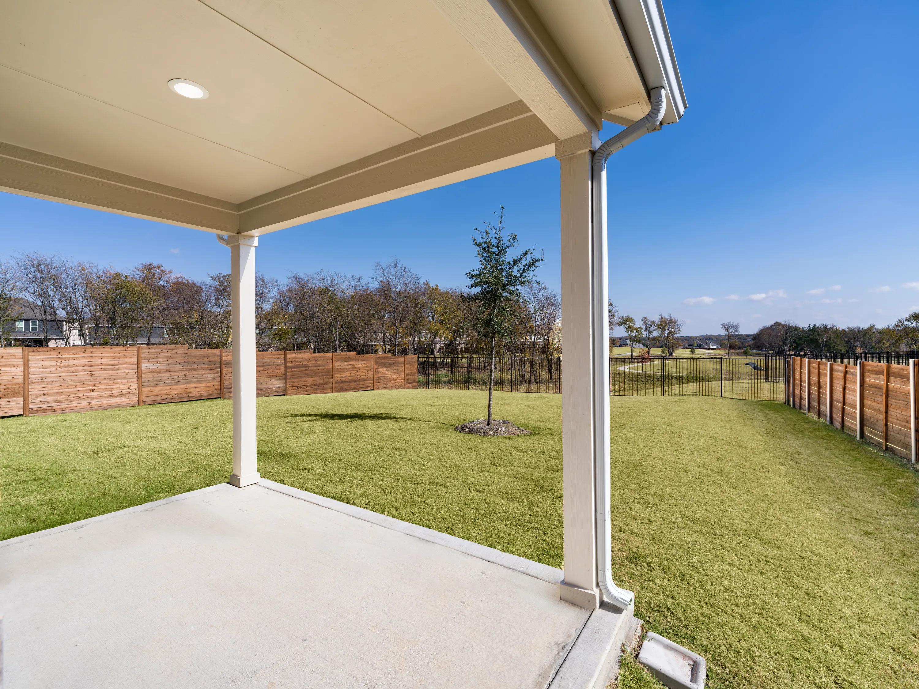large backyard area with covered patio amavi celina single family homes for rent in texas