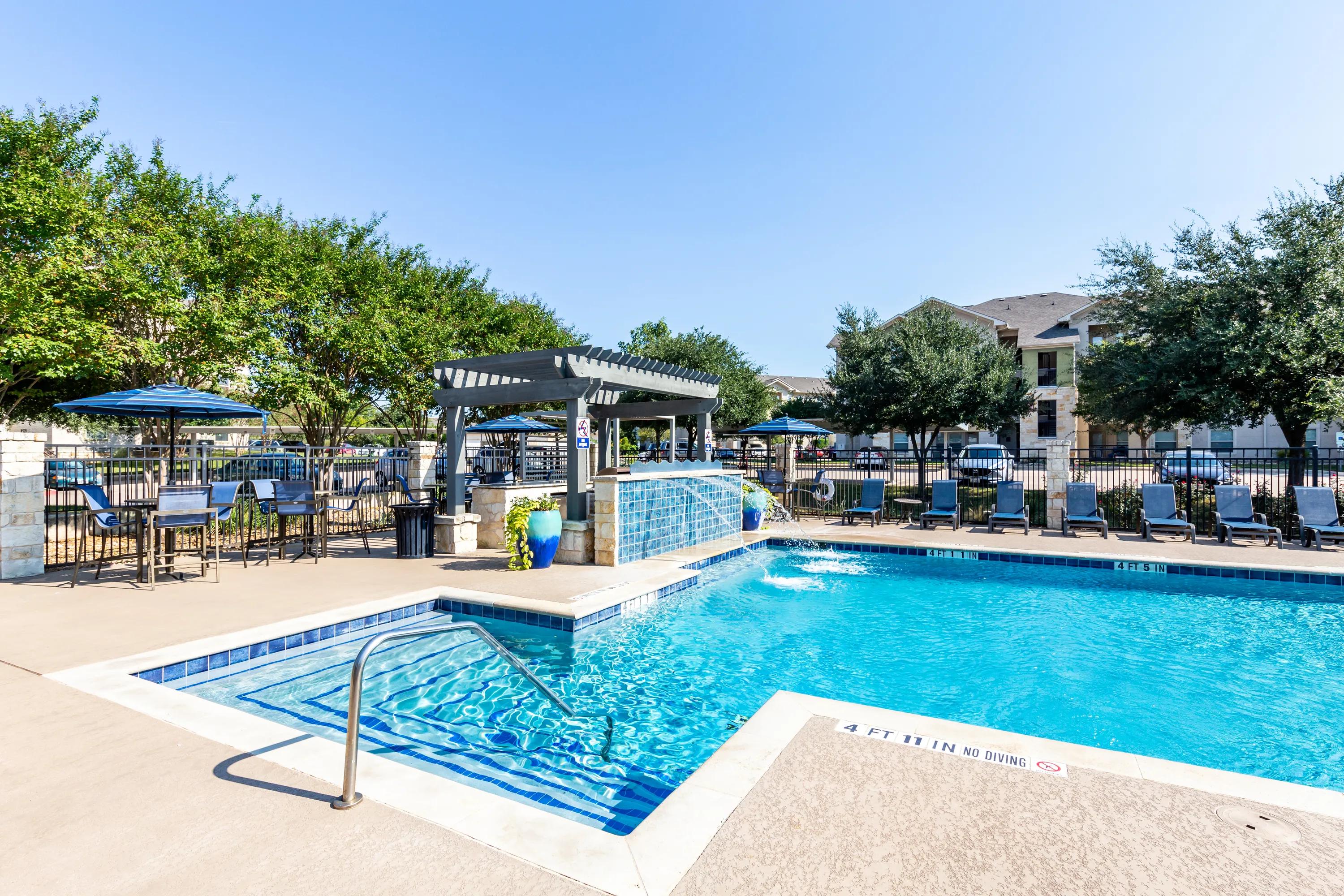 Image of pool and lounge area at Alister Oak Hill