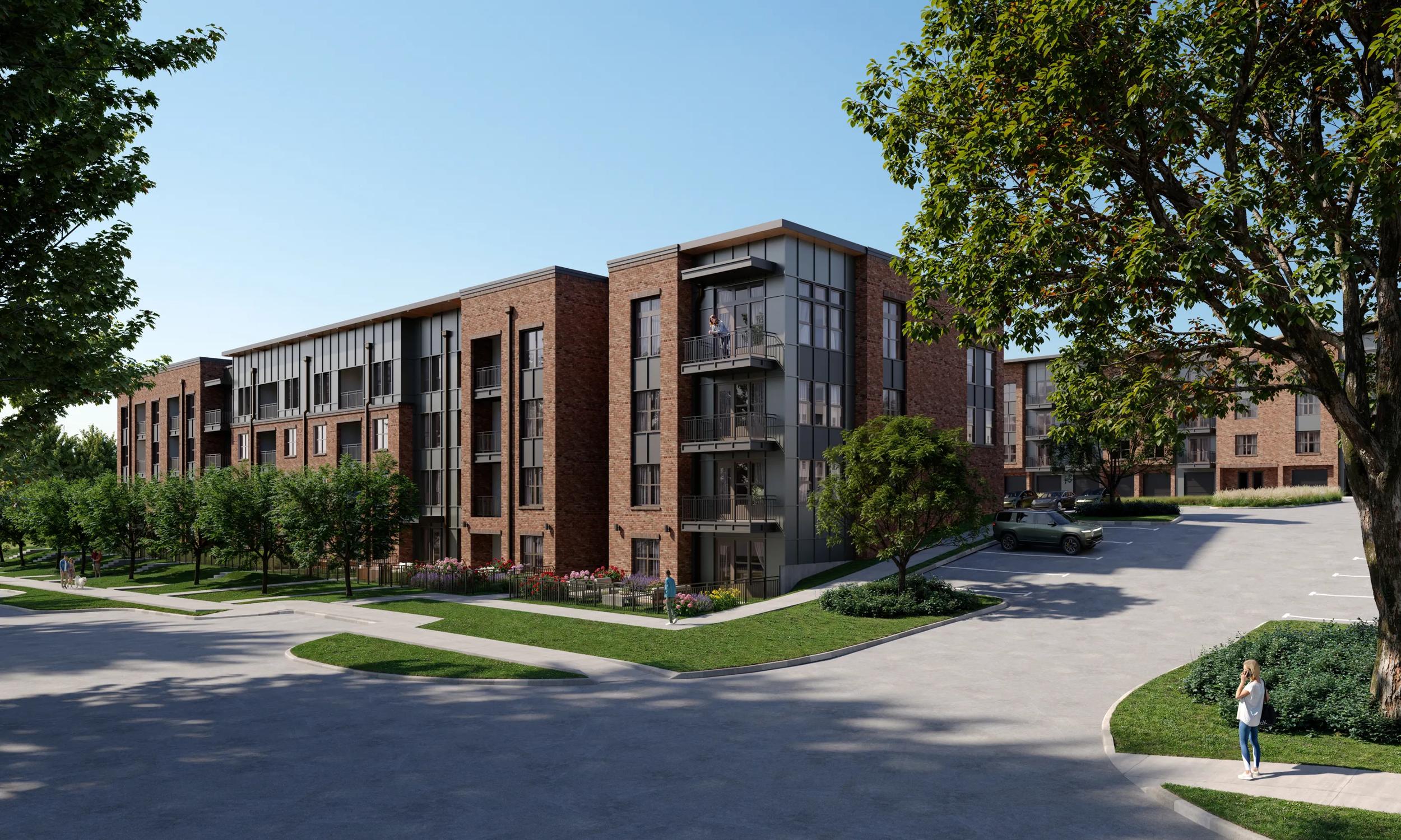 Stunning modern apartment complex with brick facade, lush greenery, and convenient bike racks along the bustling street.