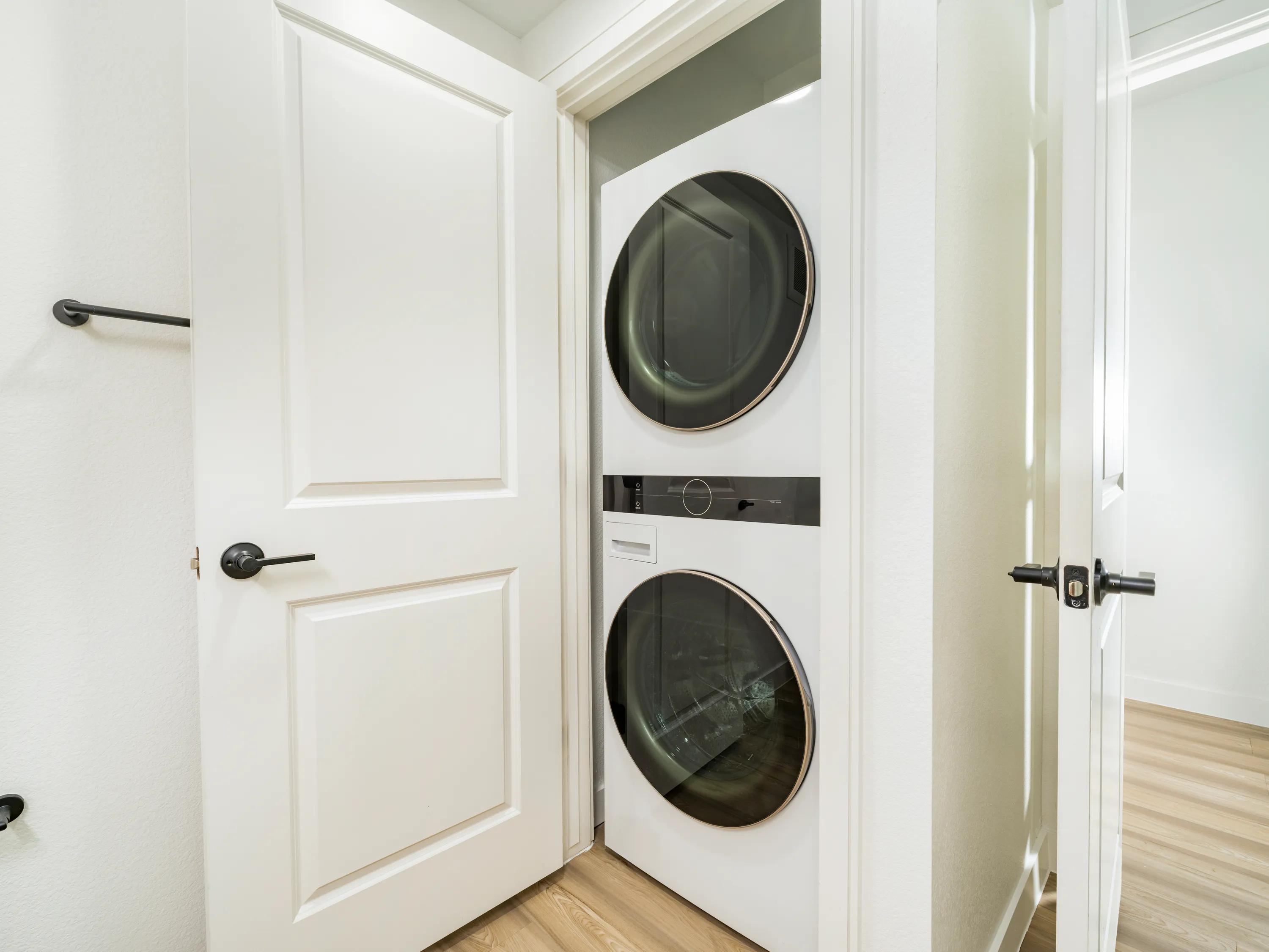 In-home, stackable washer and dryer with center mounted controls modera rio salado