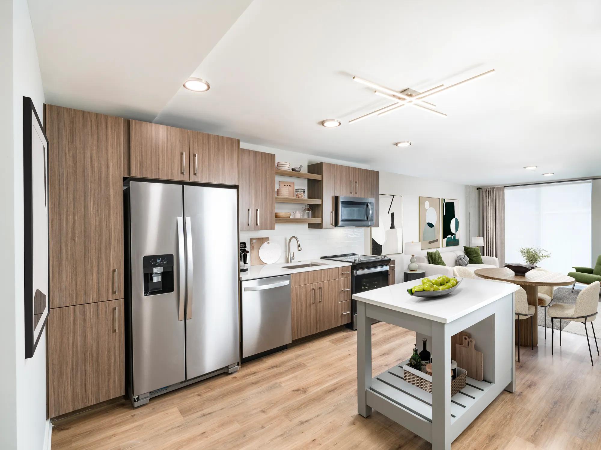 kitchen with dark cabinetry and stainless steel appliances modera loso apartment homes for rent in charlotte nc