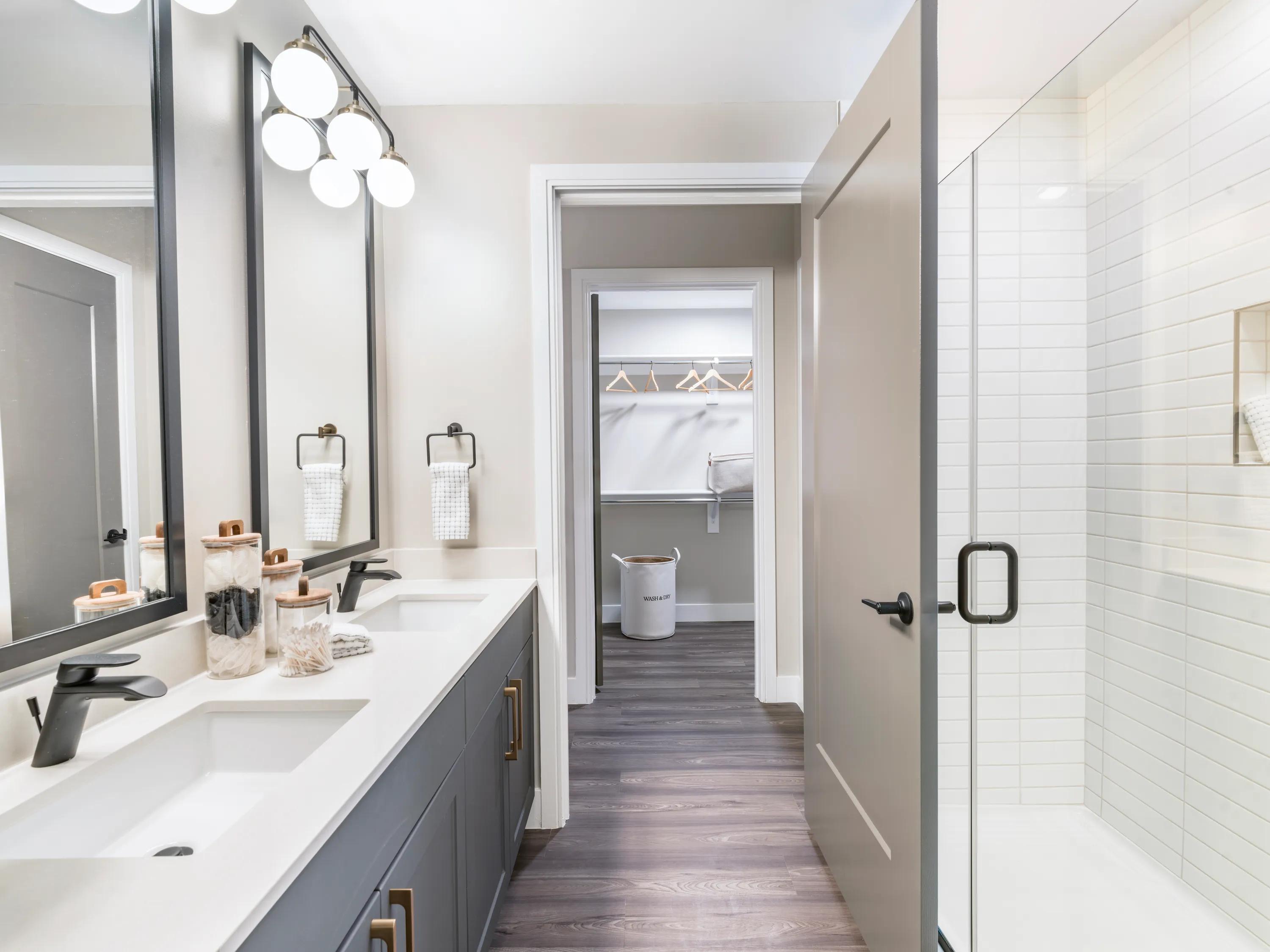double vanity pass through bathroom with closet and shelving modera reserve apartment homes for rent in scottsdale az